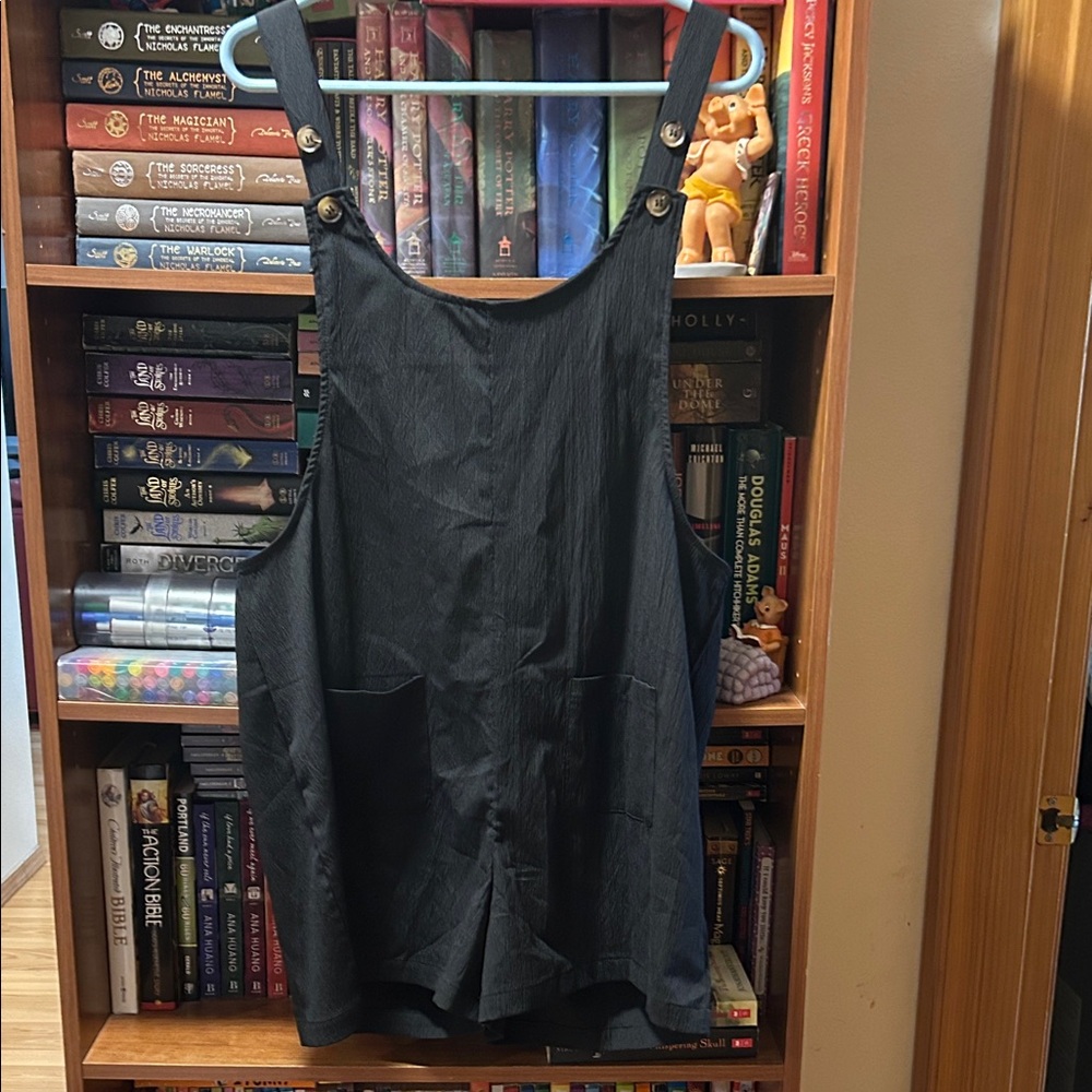 Black Romper With Adjustable Button Straps - image 1